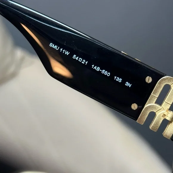 Miu Miu Black Oval Sunglasses with Gold Logo Temples - Picture 3 of 14